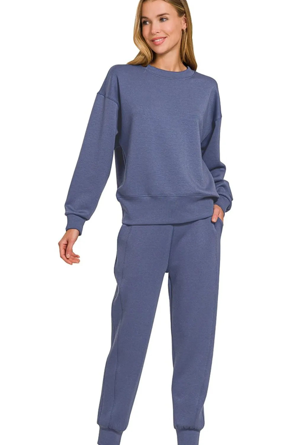 Blue Indigo Zenana scuba crewneck pullover and joggers 2-piece set by Trendsi, featuring comfortable relaxed fit and casual style.