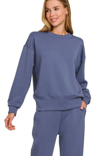 Blue Zenana scuba crewneck pullover and joggers 2-piece set from Trendsi, comfortable loungewear ensemble with relaxed fit.