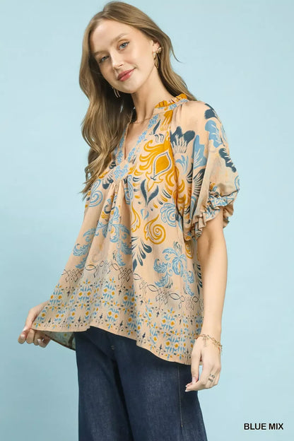 Blue mix Umgee border print puff sleeve V-neck blouse, stylish women's top with flowy sleeves and vibrant design.