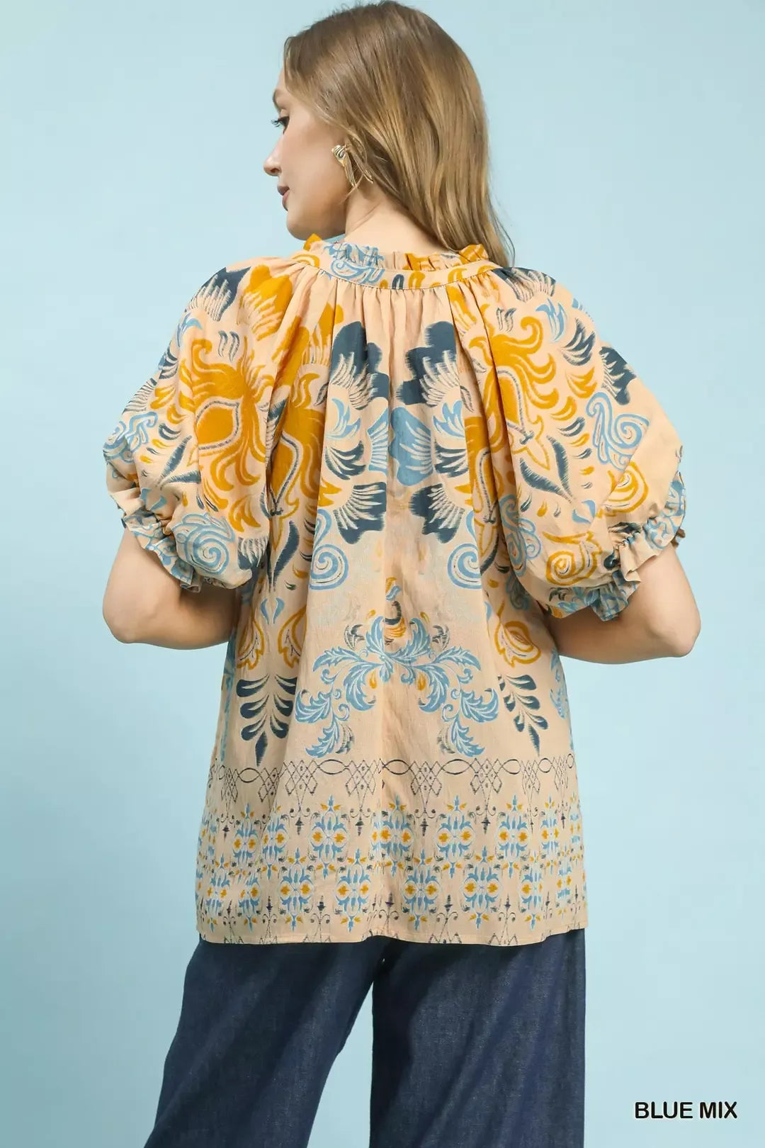 Blue and white border print puff sleeve V-neck blouse by Umgee, featuring a trendy design and soft fabric.
