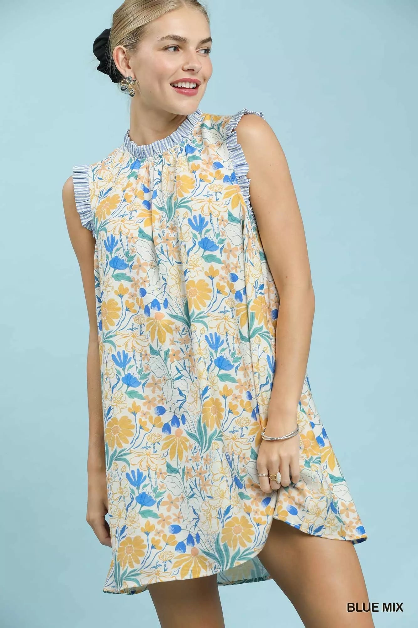 Blue floral print babydoll dress by Umgee featuring a relaxed fit and feminine design, perfect for casual and summer wear.