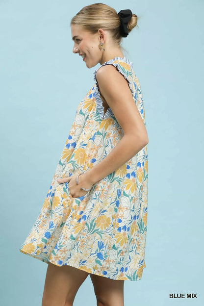 Blue floral print Umgee babydoll dress with a relaxed fit and soft fabric, perfect for casual or summer wear.
