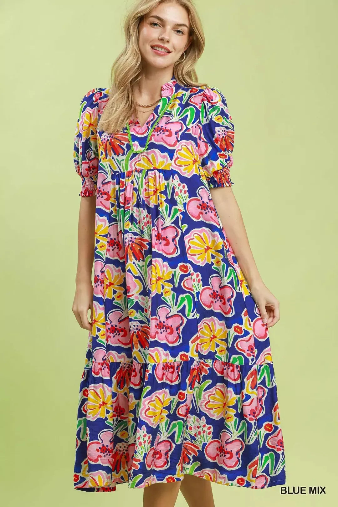 Blue floral print Umgee puff sleeve tiered midi dress with a flowy silhouette and feminine design.