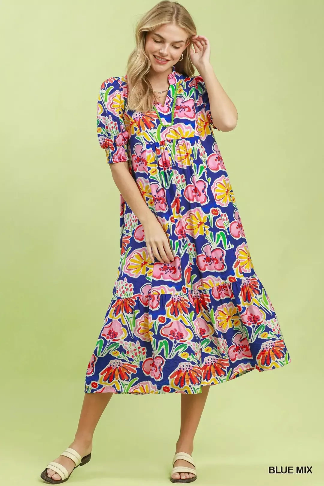 Blue floral print puff sleeve tiered midi dress by Umgee, featuring a flowy silhouette and feminine design.