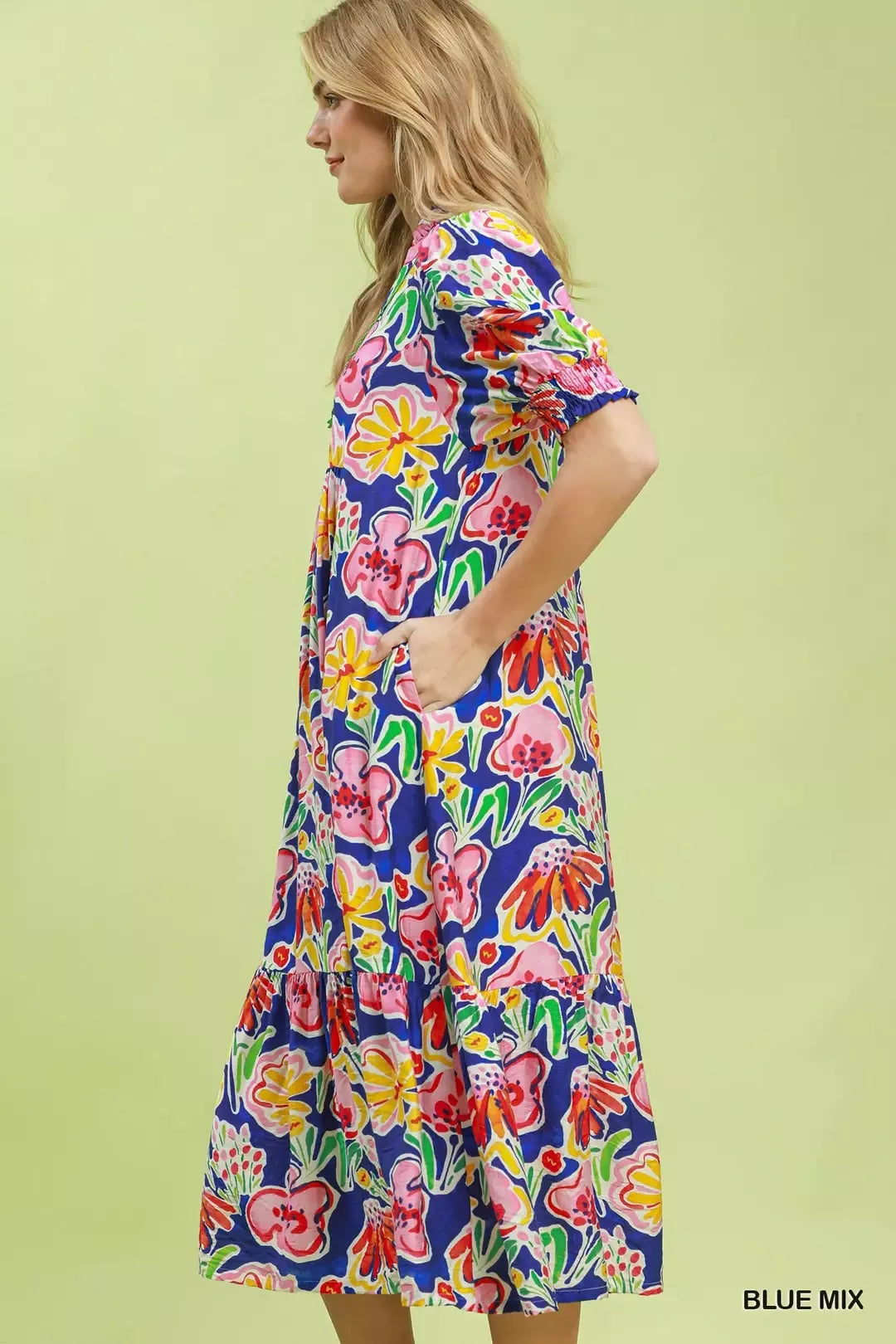 Blue floral print Umgee puff sleeve tiered midi dress featuring a feminine silhouette and tiered skirt design.