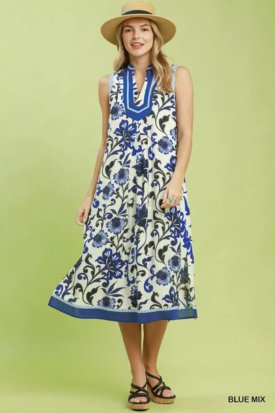 Blue floral scroll sleeveless midi dress by Umgee featuring a flowy design and elegant pattern, perfect for summer or casual occasions.