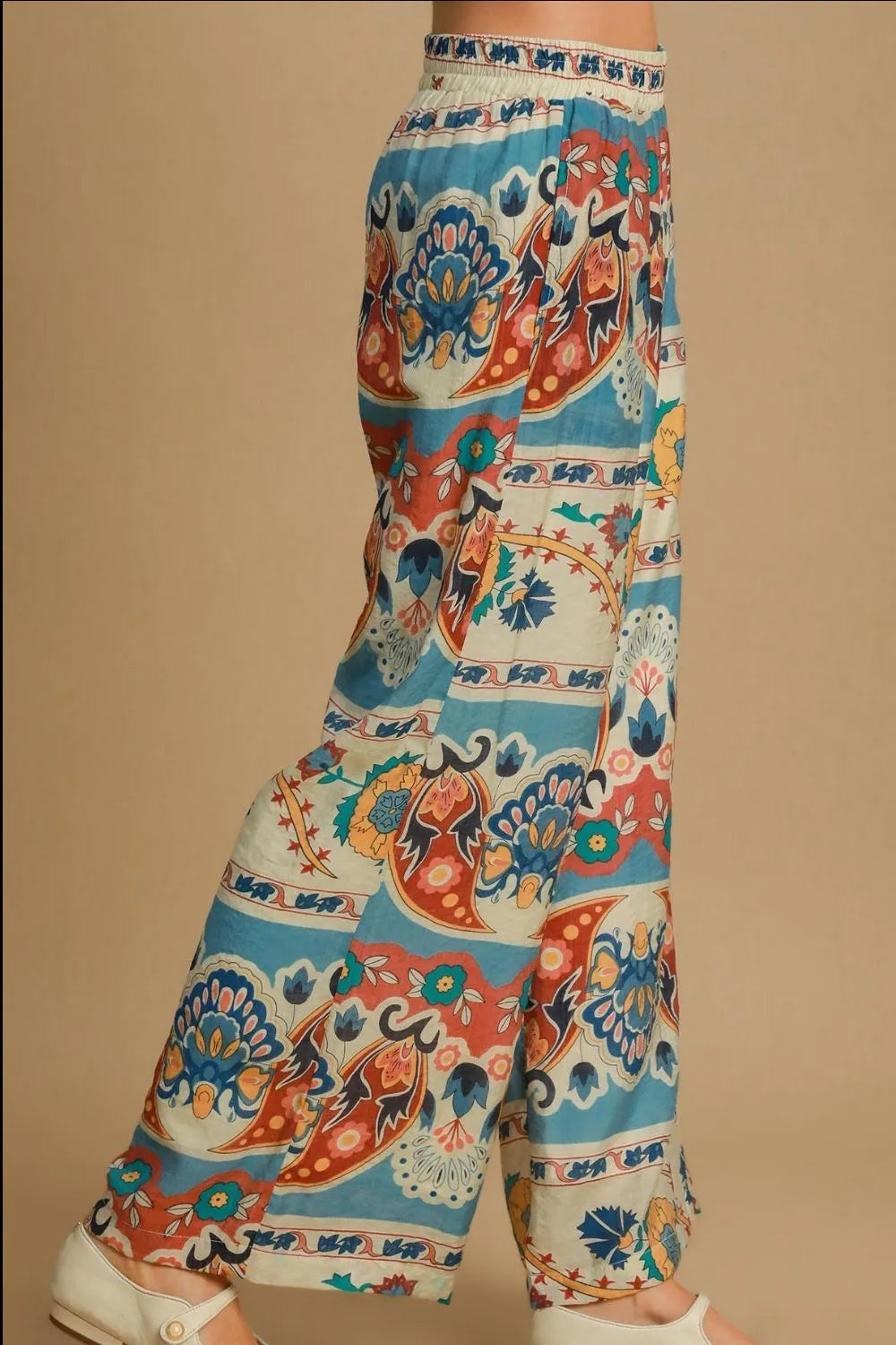 Plus size Umgee wide leg border print pants in blue mix, featuring a relaxed fit and stylish design for casual wear.