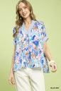 Blue Umgee Mix Boho printed V-neck top with relaxed fit and short sleeves, featuring a stylish, casual design.