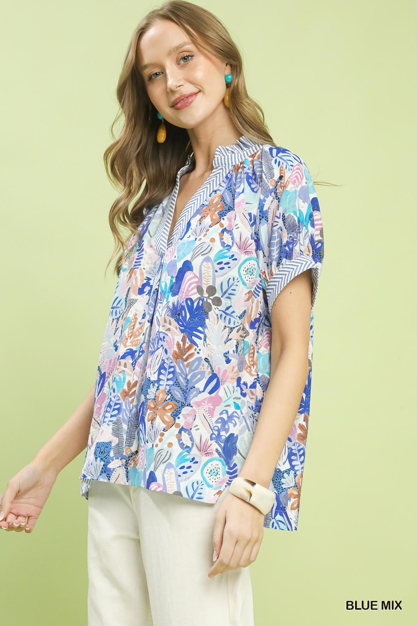 Blue Umgee Mix Boho printed V-neck top with a relaxed fit, featuring a stylish bohemian pattern and lightweight fabric.