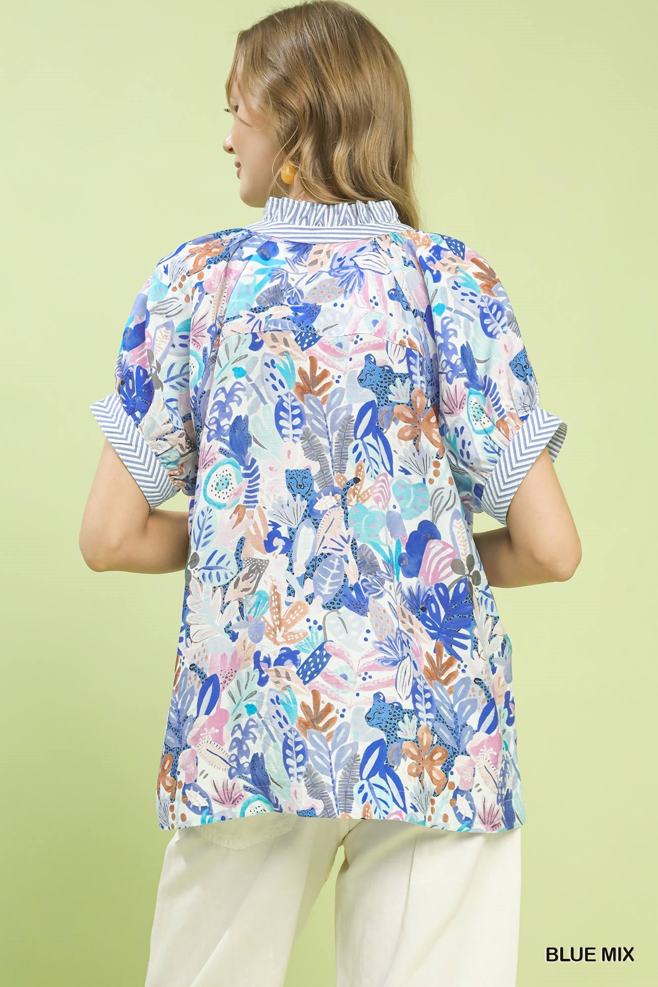 Blue Umgee Mix Boho printed V-neck top with relaxed fit and bohemian style, featuring vibrant patterns and soft fabric.