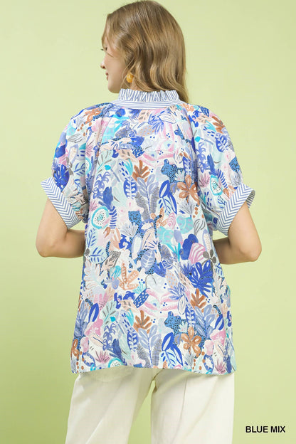 Blue Umgee Mix Boho printed V-neck top with relaxed fit and bohemian style, featuring vibrant patterns and soft fabric.