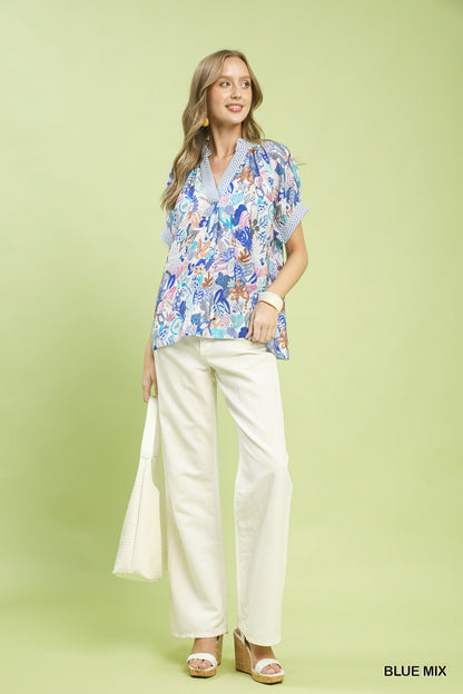 Blue Umgee Mix Boho printed V-neck top with relaxed fit and bohemian style, featuring colorful abstract patterns.