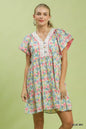 Blue Umgee floral tiered mini dress with side pockets, featuring a mixed floral pattern and lightweight fabric.