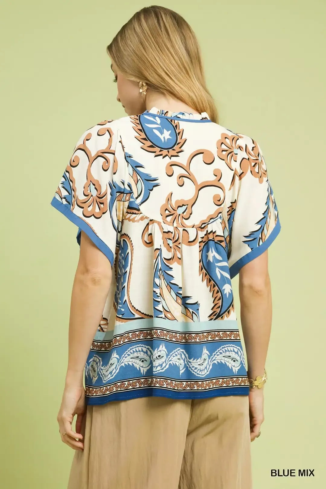 Blue Umgee Mix Paisley Border Print Tassel Top with tassel details and relaxed fit, featuring a stylish paisley border design.