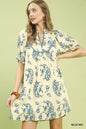Blue Umgee Mix Paisley Scallop Trim Dress with flowy fabric and intricate paisley pattern, styled with scalloped hem detail.
