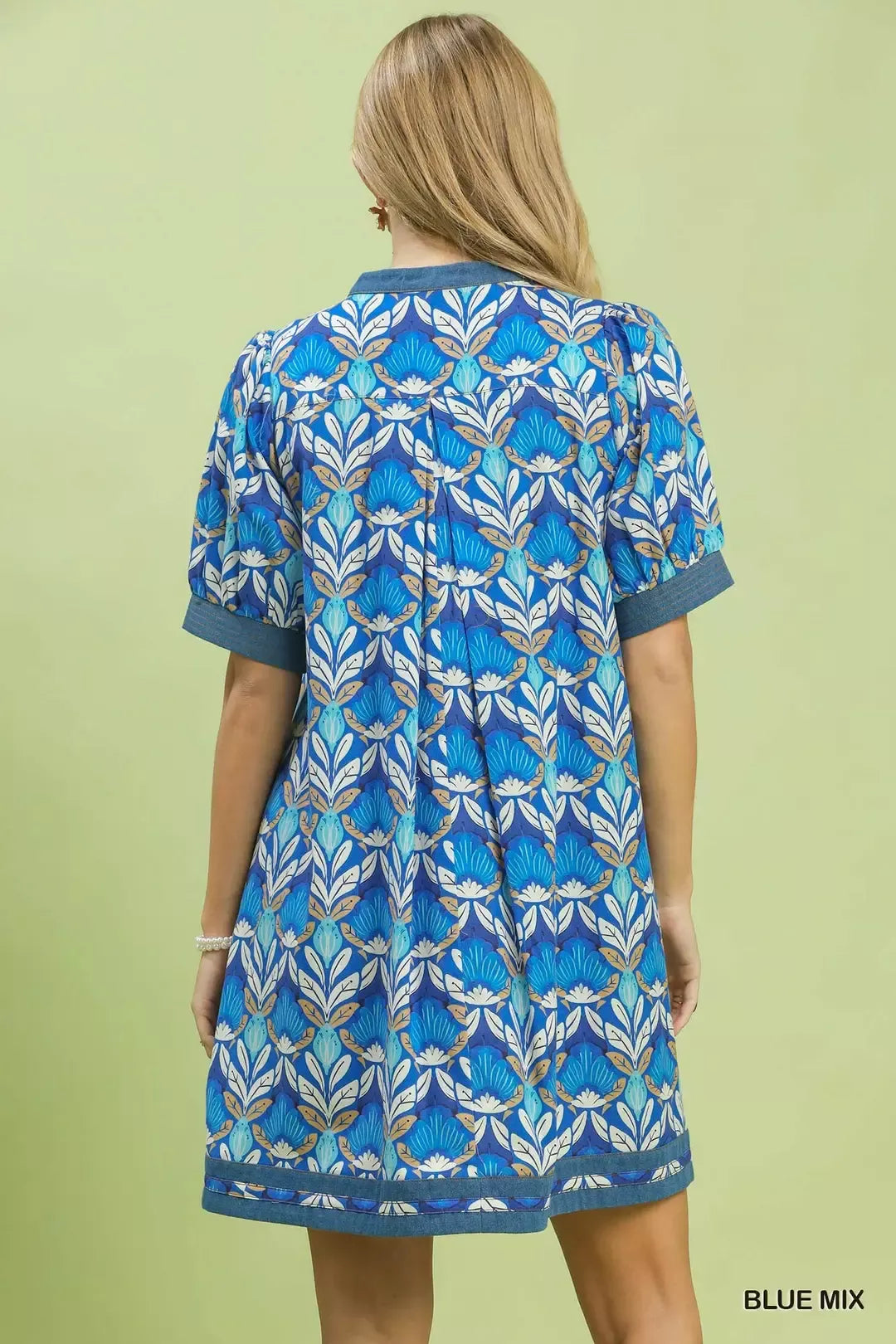 Blue Umgee Mix Tile Print Mini Dress from Trendsi, featuring a stylish pattern and sleeveless design, perfect for casual wear.
