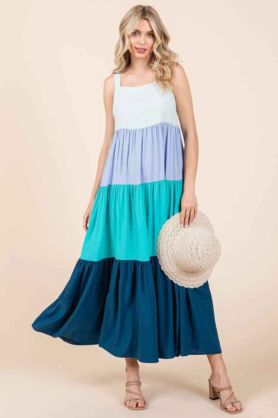 Blue multi-color tiered pull-on maxi dress by Mittoshop, featuring a color block design and flowing silhouette.
