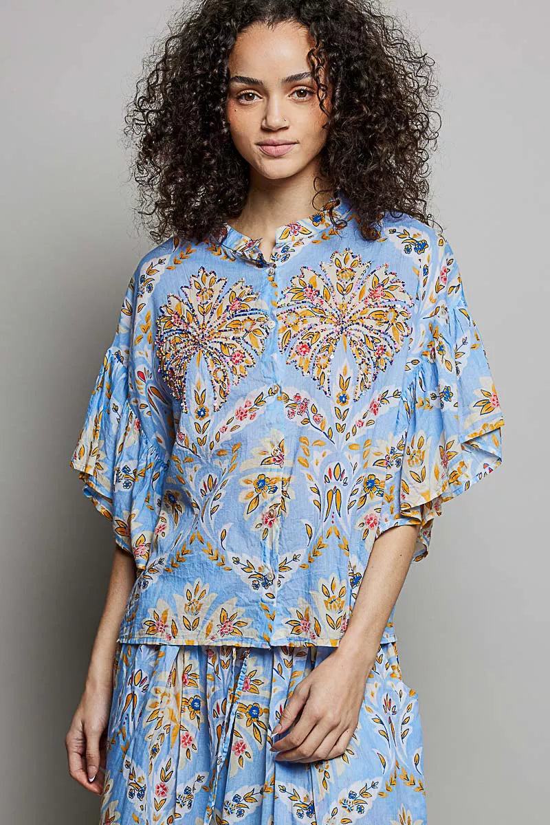 Blue multi floral printed woven ruffle sleeve shirt from Trendsi with a stylish, feminine design and ruffled sleeve details.