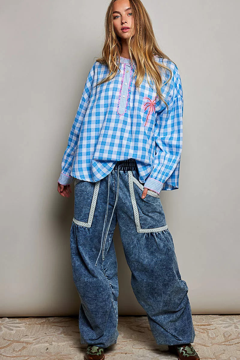 Blue and multi-colored gingham embroidered palm tree blouse from Trendsi, lightweight and stylish for casual wear.