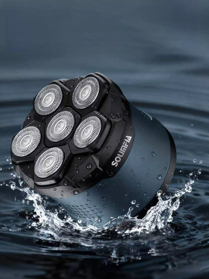 Blue 6-blade rechargeable head shaver from Trendsi with a sleek design and ergonomic handle for easy head hair removal.