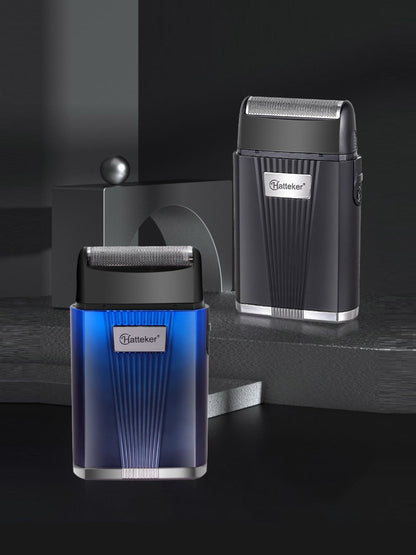 Blue portable electric shaver from Trendsi with a sleek design, compact for easy handling and on-the-go grooming.