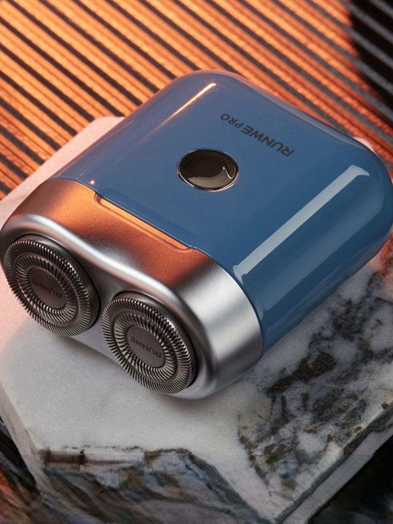Blue Trendsi mini portable electric shaver with compact design and easy grip, ideal for quick grooming on the go.