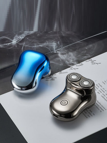 Blue waterproof rotary shaver by Trendsi with a sleek design, suitable for wet and dry use, perfect for close shaving.