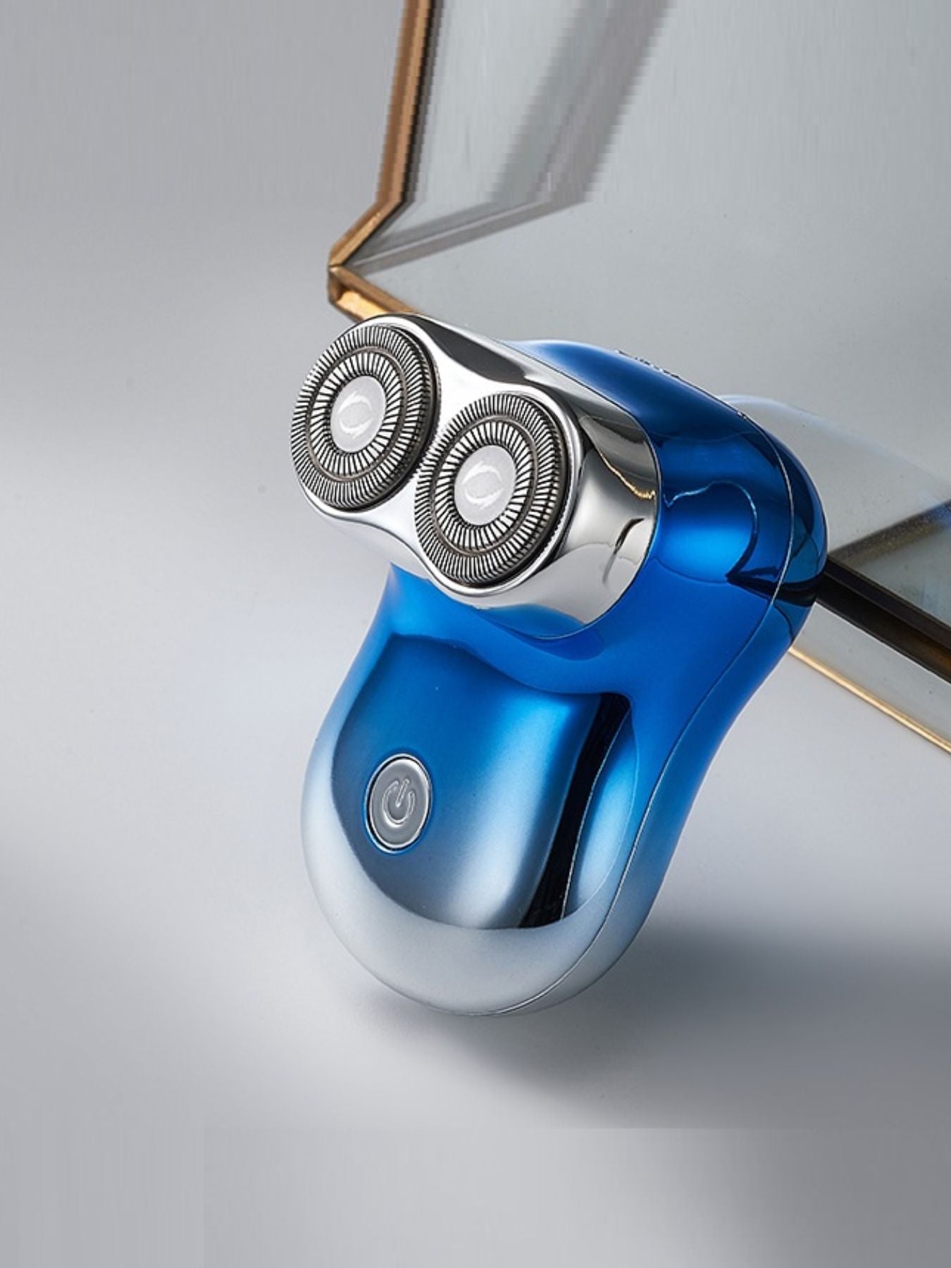 Blue waterproof rotary shaver by Trendsi with a sleek design for wet and dry grooming.