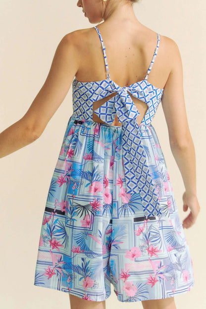 Blue and pink Davi & Dani tropical floral geo print tie-back tube top romper with sleeveless design and relaxed fit.