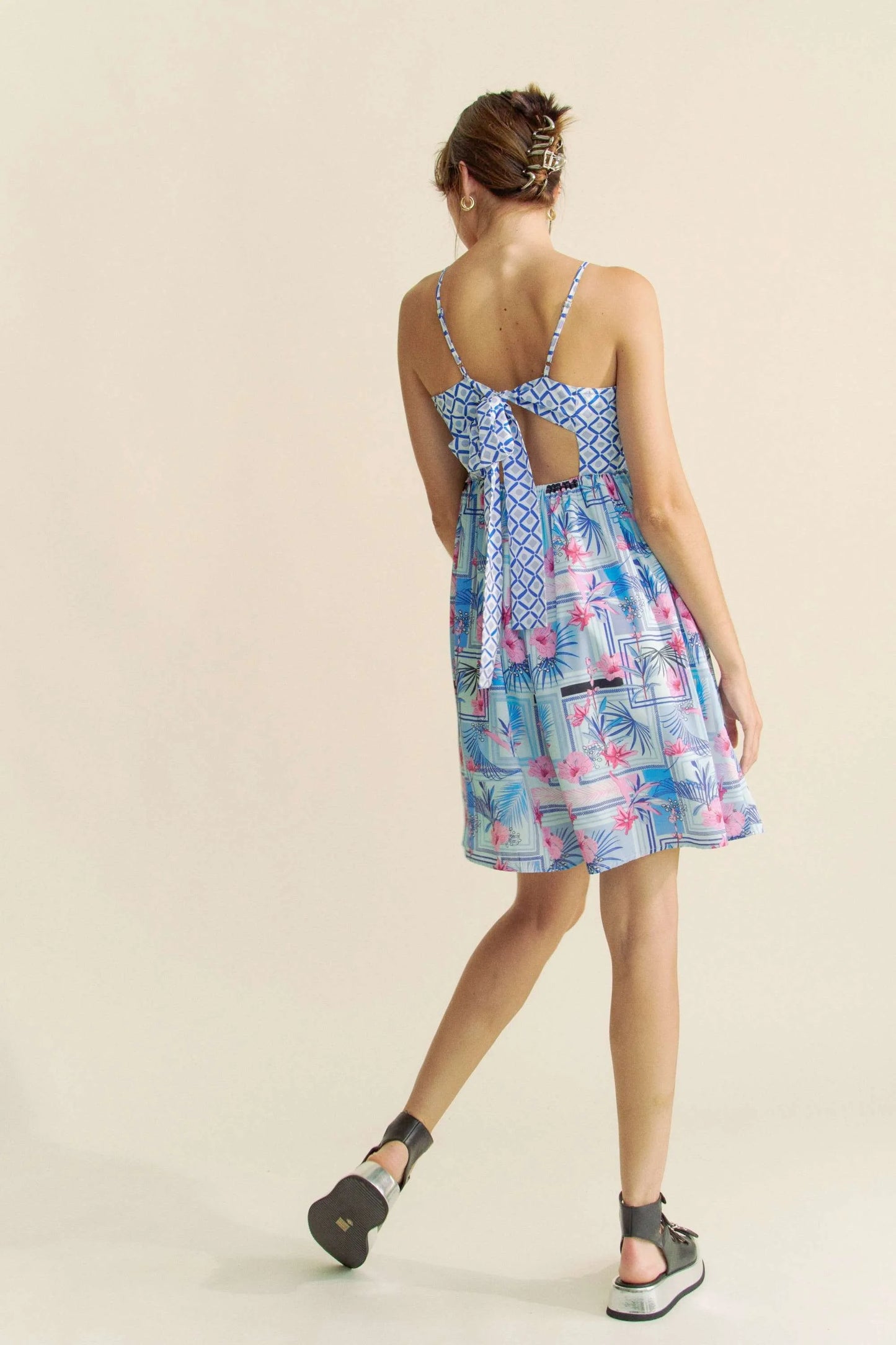 Blue and pink tropical floral geo print tie-back tube top romper by Davi & Dani, featuring a stylish sleeveless design.