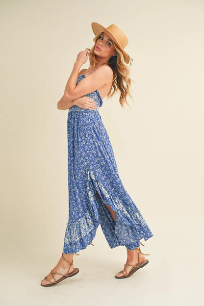 Blue Aemi + Co ditsy floral maxi cami dress with ruffled hem, featuring a flowy, feminine design perfect for summer wear.