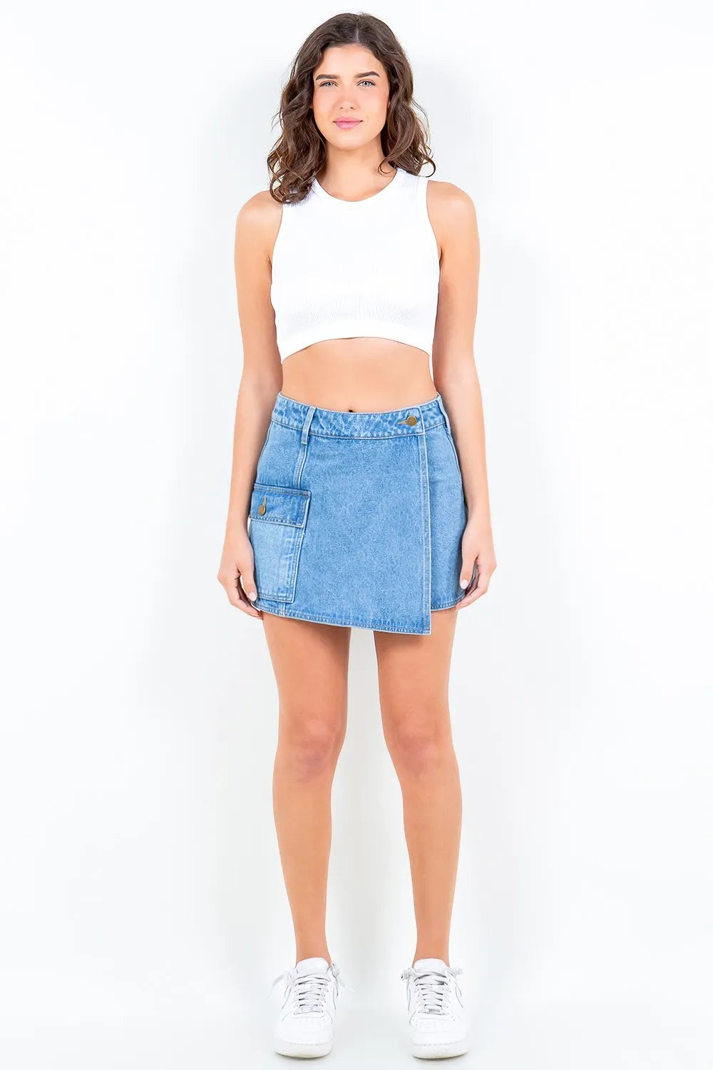 Blue American Bazi denim skort with cargo pockets, casual style, from Trendsi, featuring a front button and side pocket details.