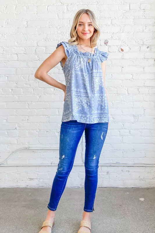 Blue boho print ruffle baby doll tank top by Trendsi, featuring a relaxed fit and feminine ruffle details.