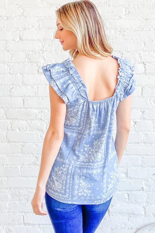 Blue boho print ruffle baby doll tank top by Trendsi, featuring a stylish relaxed fit and feminine ruffle details.