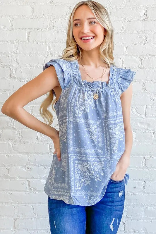 Blue boho print ruffle baby doll tank top by Trendsi, featuring a relaxed fit and feminine ruffle details.