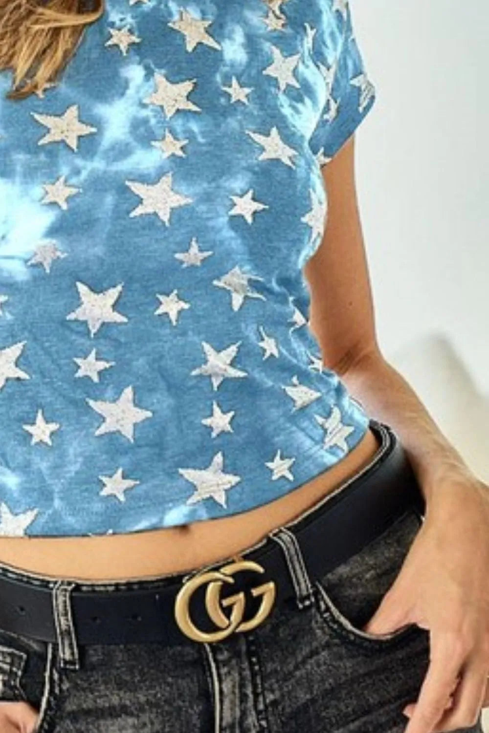 Blue Bibi star print knit back cut-out and plaid tied top by Trendsi, featuring a stylish star pattern and trendy design.