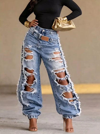 Blue distressed loose fit jeans from Trendsi, showcasing a relaxed fit with ripped details and casual denim style.