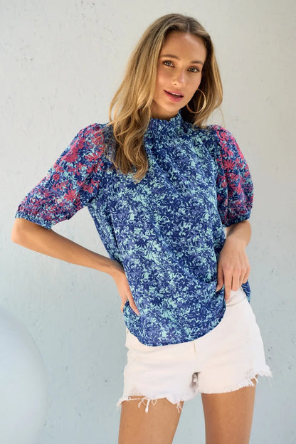 Blue Hailey & Co embroidered puff sleeve printed blouse by Trendsi, featuring intricate embroidery and stylish puff sleeves.