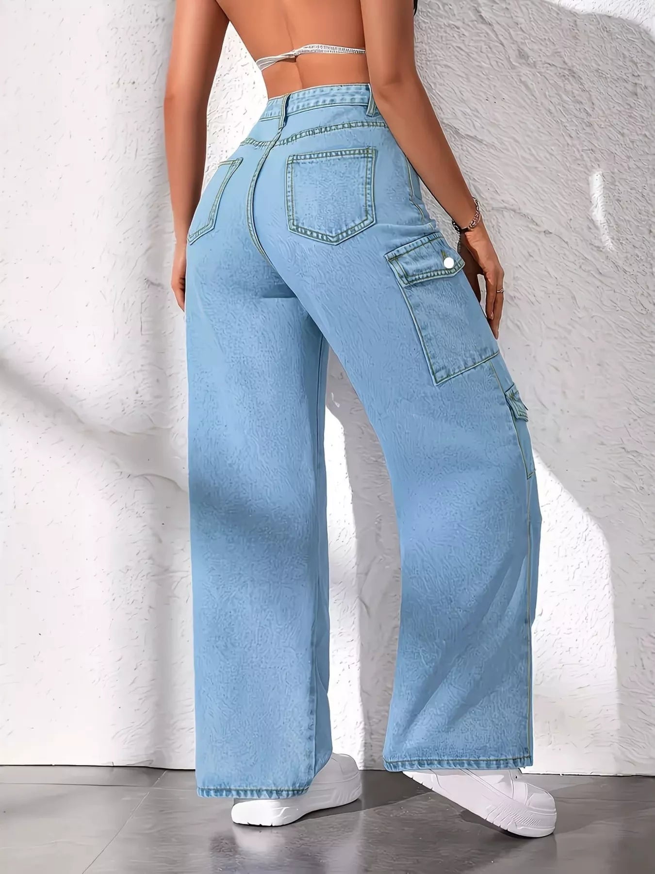 Blue high waist cargo jeans by Trendsi featuring multiple pockets and a relaxed fit.