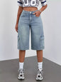 Blue high waist denim shorts from Trendsi, featuring classic five-pocket style and frayed hem design.