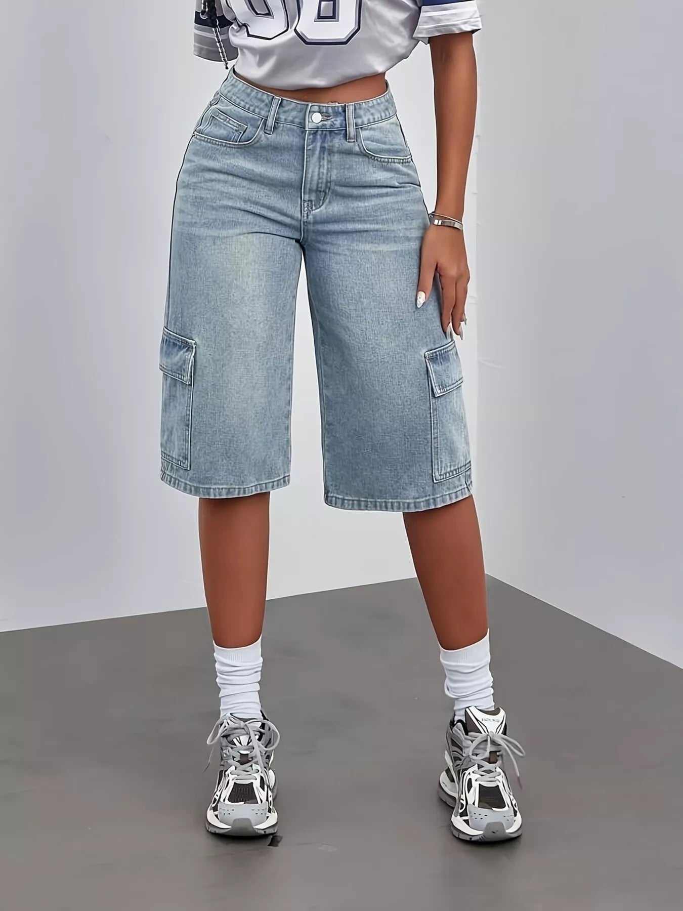 Blue high waist denim shorts by Trendsi, featuring a classic fit and stylish cut, perfect for casual summer outfits.