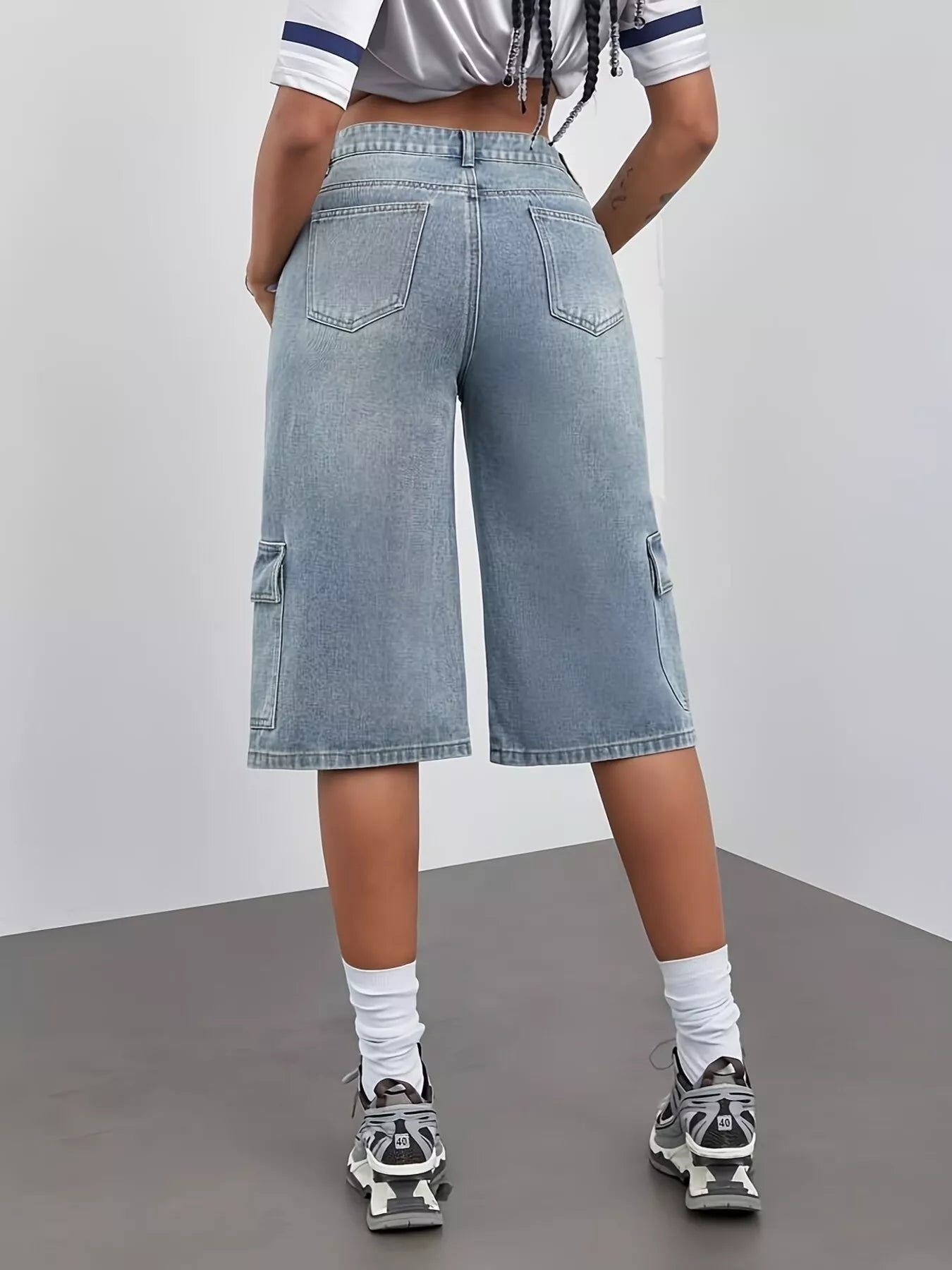 Blue high waist denim shorts from Trendsi, featuring classic five-pocket design and frayed hem for a trendy casual look.