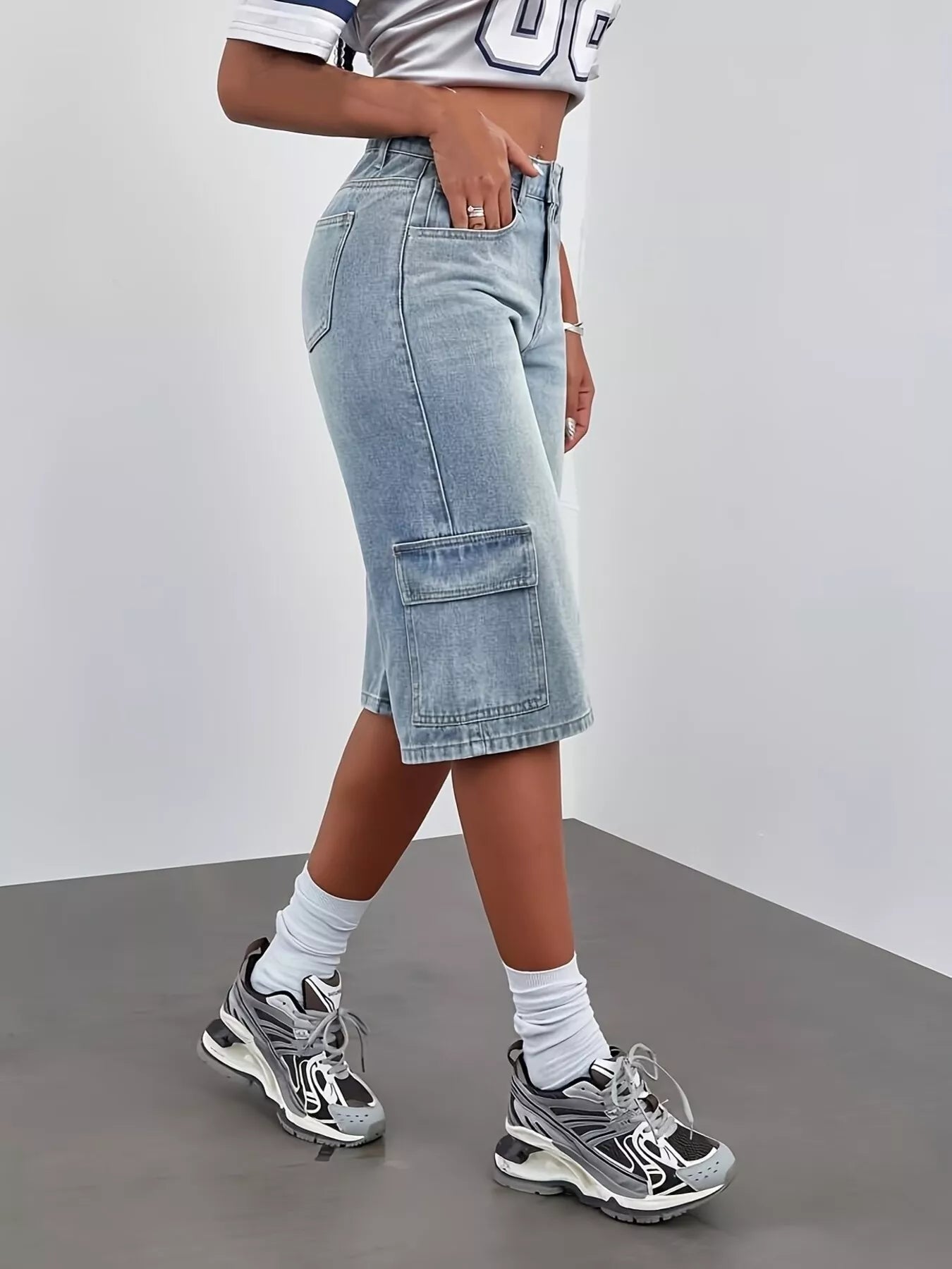 Blue high waist denim shorts by Trendsi, featuring classic five-pocket design and frayed hem for a casual summer look.