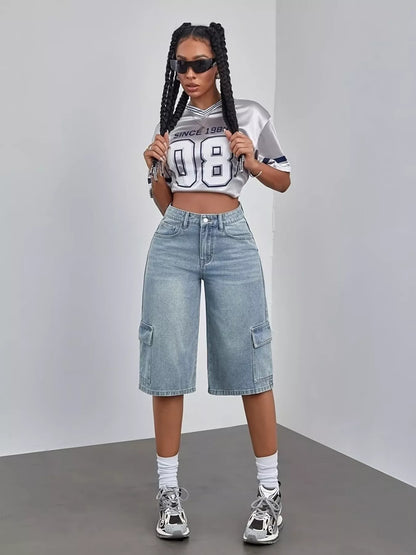 Blue high waist denim shorts by Trendsi with classic five-pocket design and frayed hem for a casual summer look.