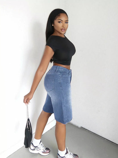 Blue high-waisted wide-leg denim shorts from Trendsi, featuring a relaxed fit and classic denim texture.