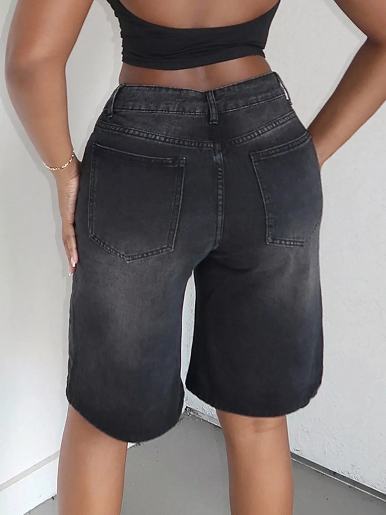 Blue high waisted wide leg denim shorts from Trendsi, featuring a relaxed fit and classic denim texture.