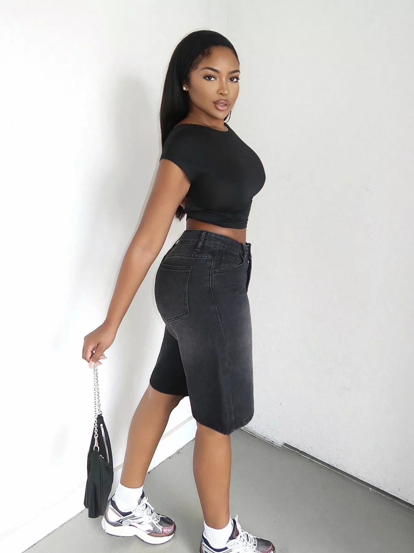 Blue high-waisted wide-leg denim shorts by Trendsi, featuring a relaxed fit and classic denim texture.