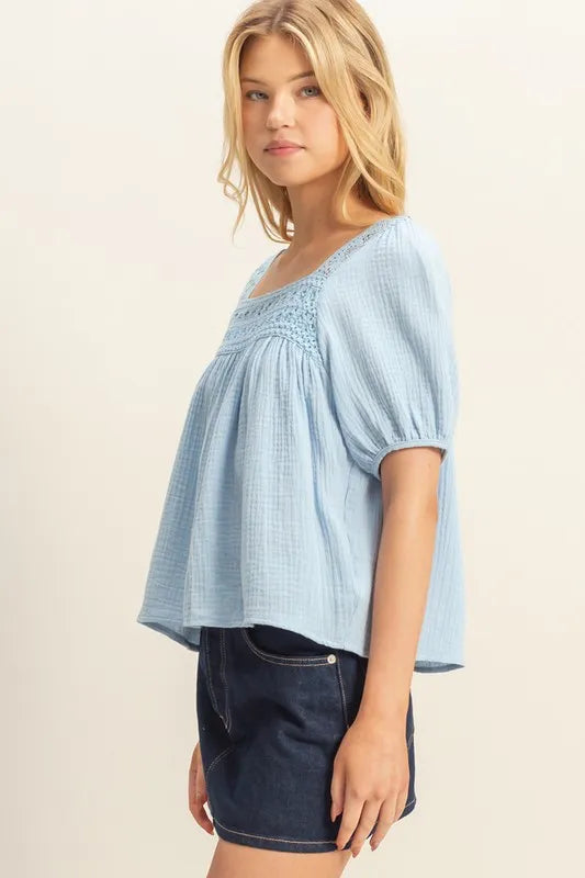 Blue HYFVE crochet detail puff sleeve peasant top with relaxed fit and feminine design, perfect for casual or boho styles.