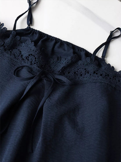 Blue lace trim cami and wide-leg pants set by Trendsi, featuring a stylish sleeveless top and flowy trousers.