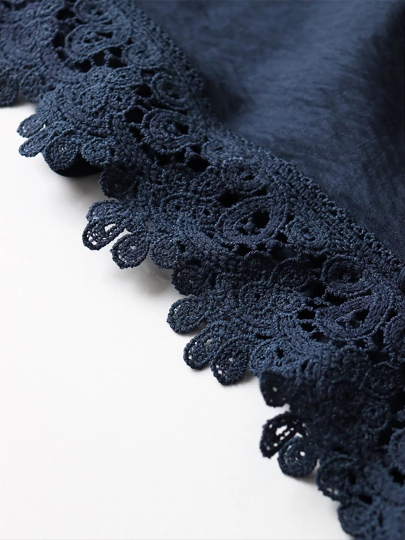 Blue lace trim cami and wide-leg pants set by Trendsi, featuring a stylish, coordinated look with delicate lace details.
